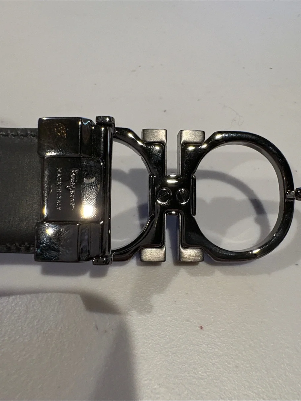 Salvatore Ferragamo Leather Gancini Belt with Silver Buckle. Size 42 black/Navy